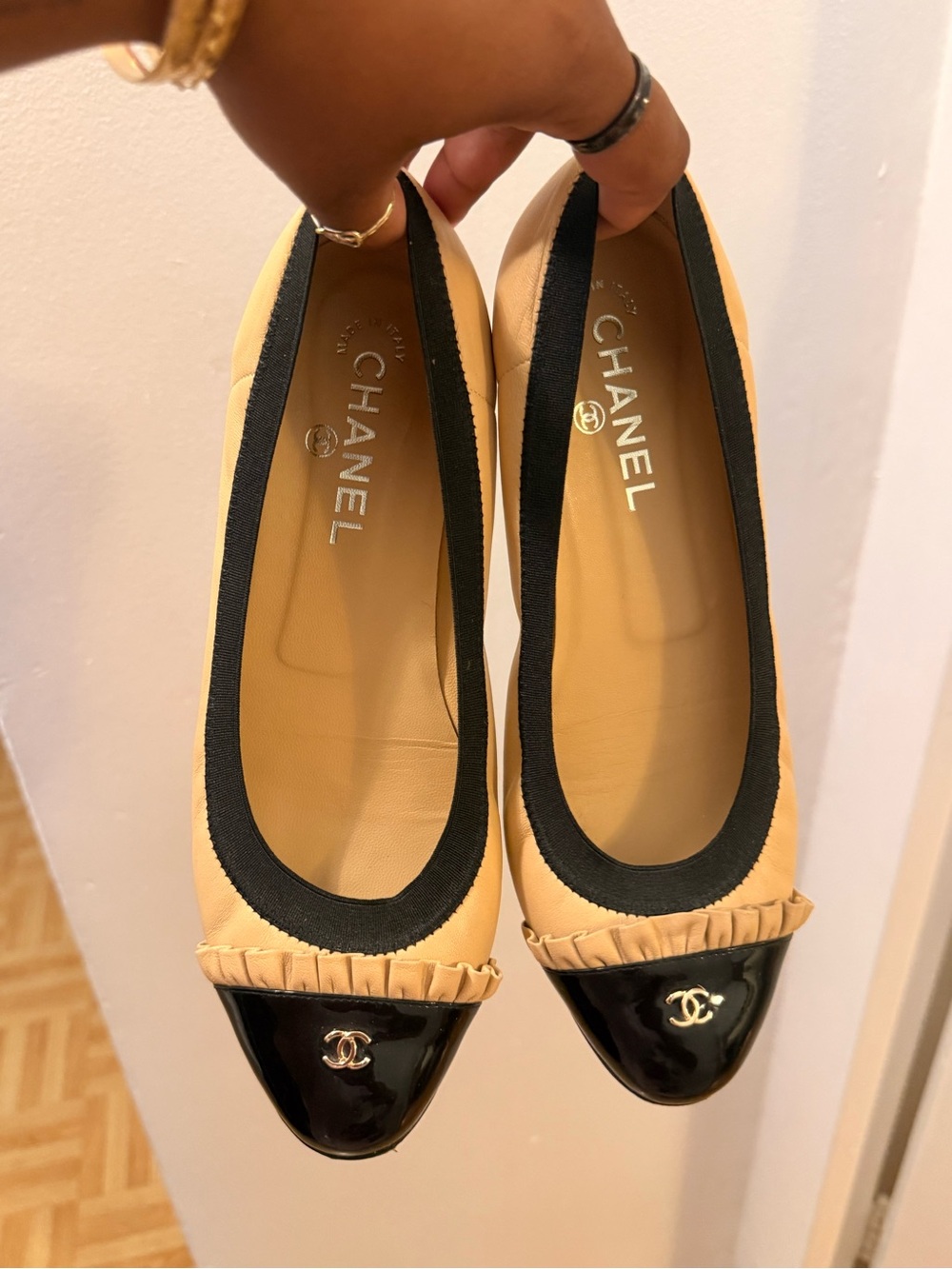 AUTHENTIC CHANEL Beige Leather Ballet Flats with Black Patent Cap Toe